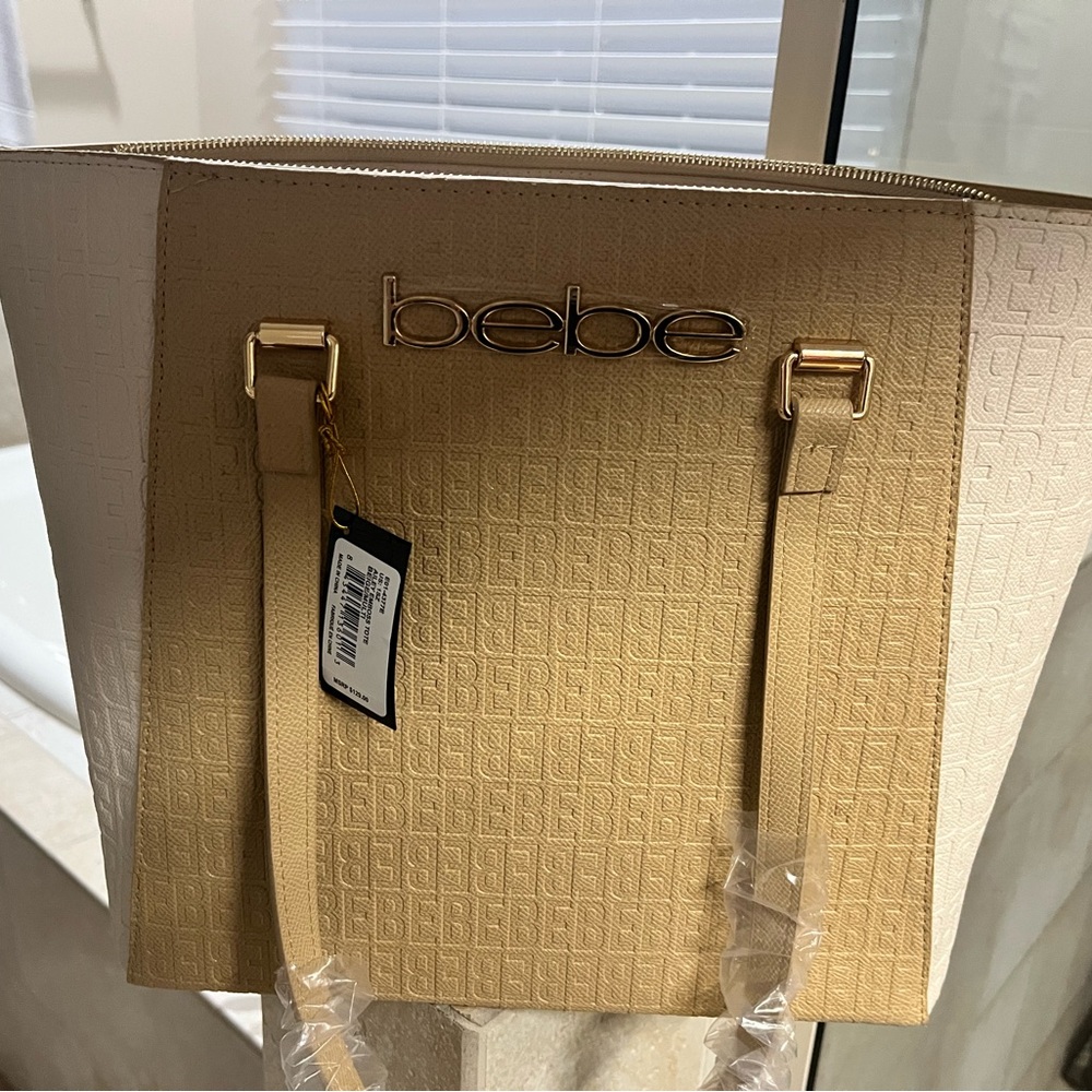 New with tags- still in wrapper Cream Bebe Tote- lap top size bag 15x11”